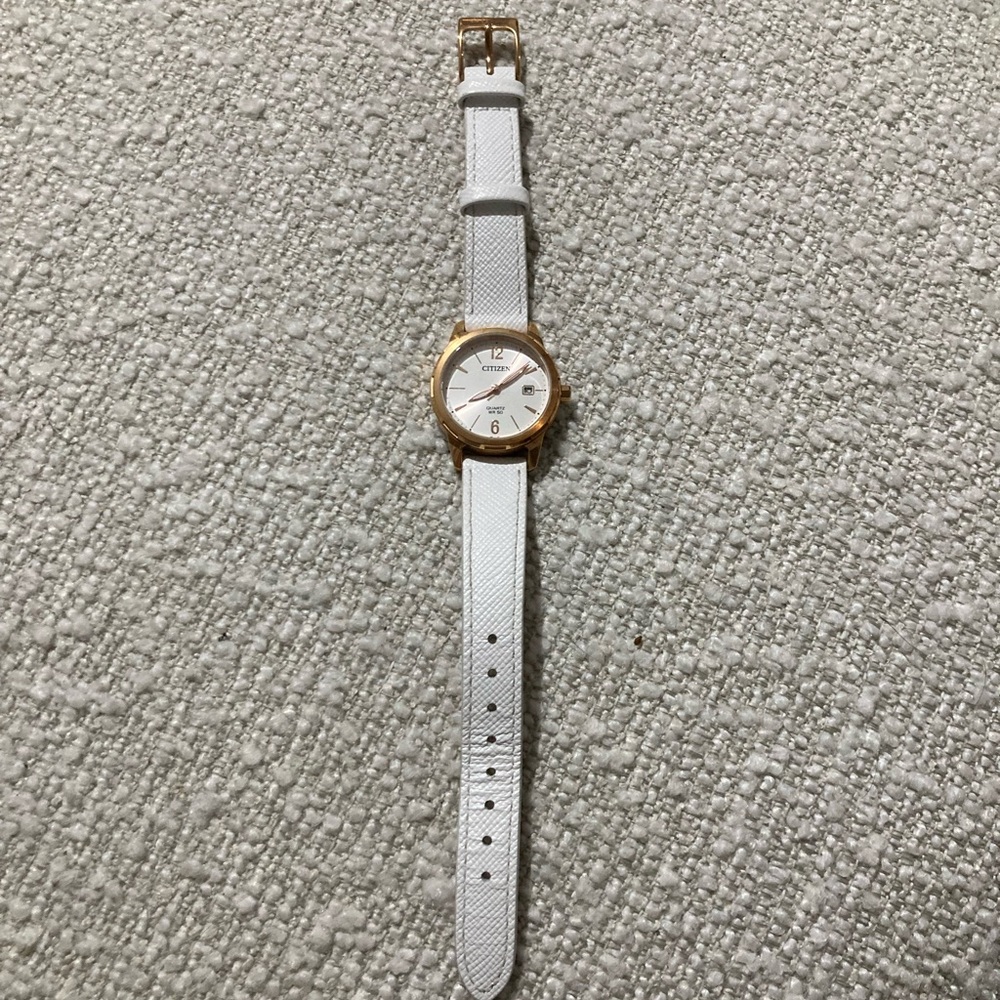 Citizen Women's Watch with White leather band. Near new